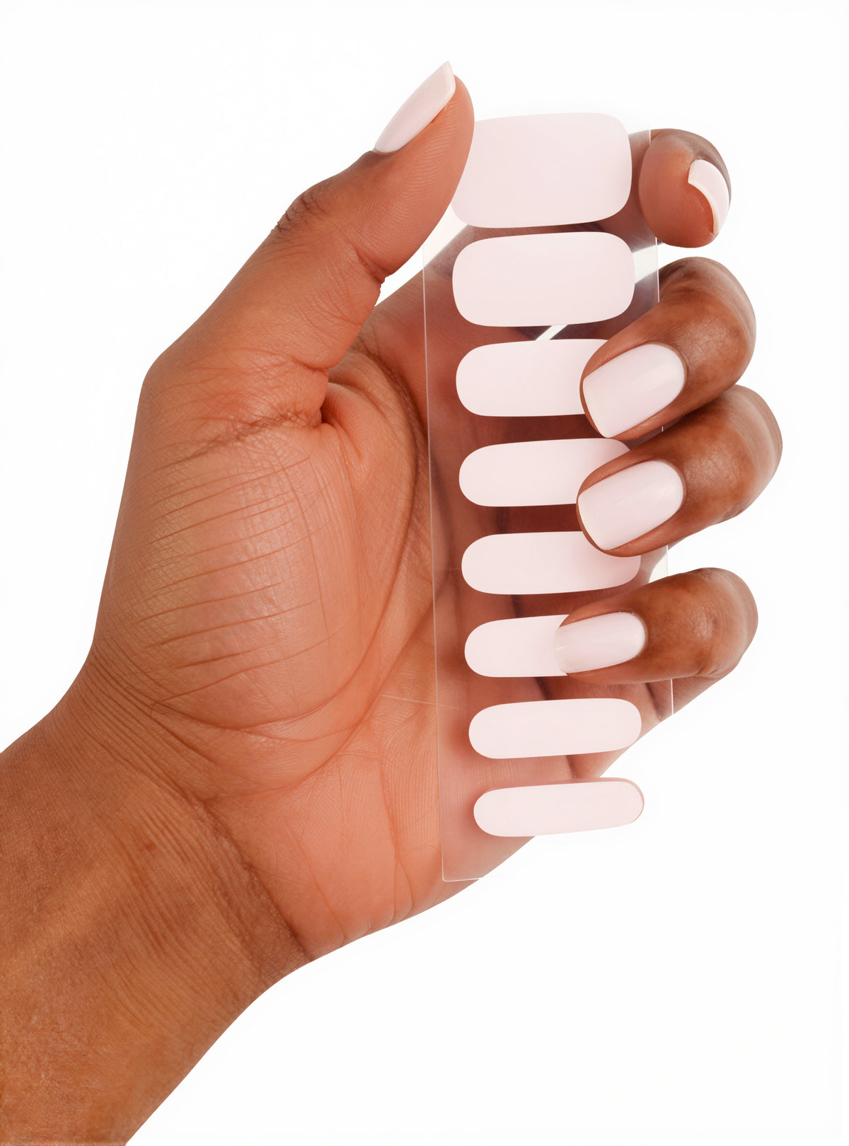 NailKind The Gel Wraps First Blush pink gel nail wraps on hand